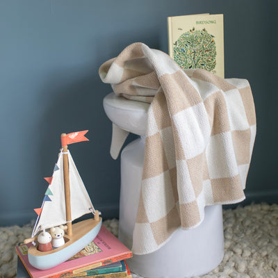 Beige Checkers Throw in Baby Nursery
