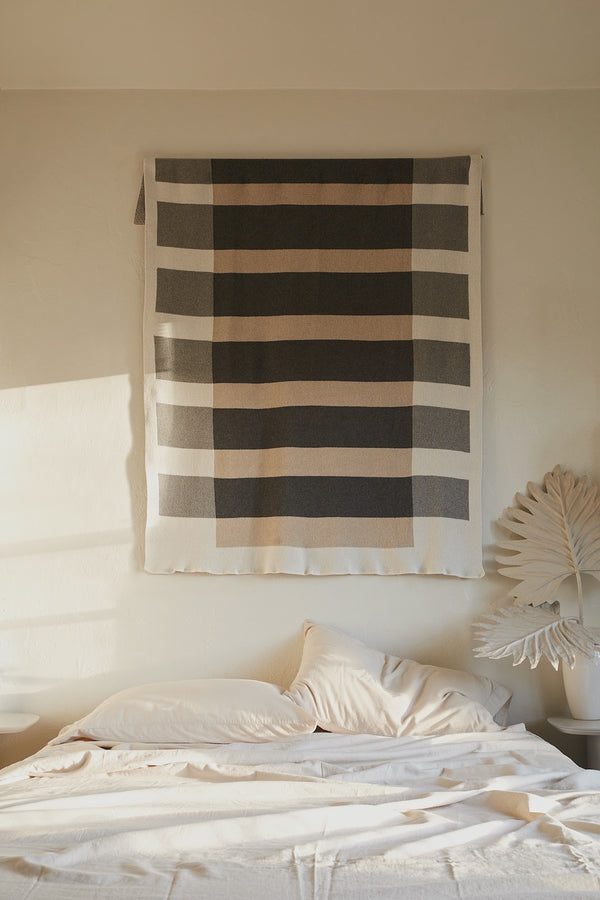 Bauhaus Modern Neutral Throw Blanket on Wall