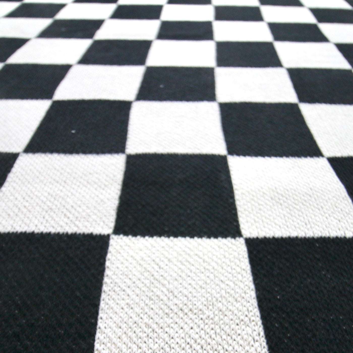 Close up of Black and White Checkered Throw 