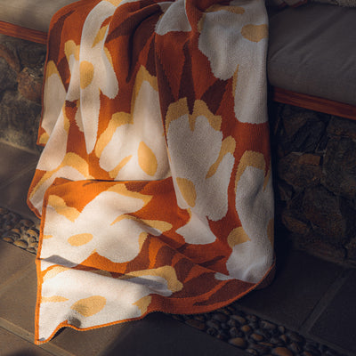 Rust Floral Throw in the Sunlight
