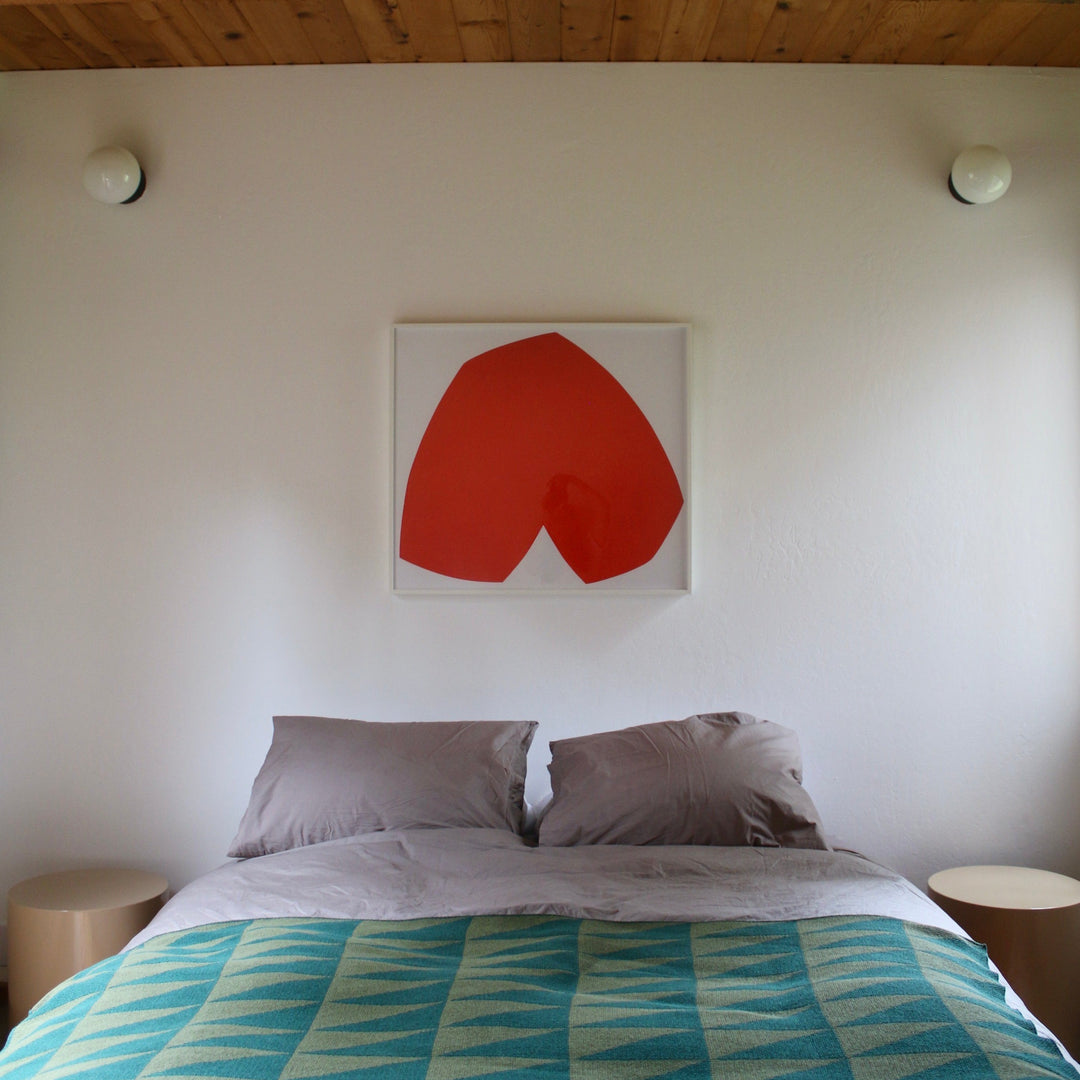 Triangle Pattern Throw Blanket in Modern Bedroom with Abstract Art