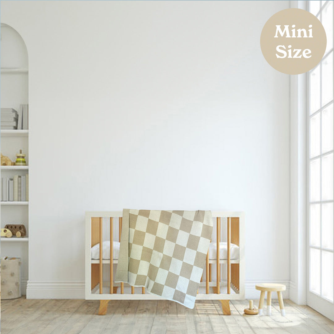 Neutral Nursery with Checkered Baby Blanket