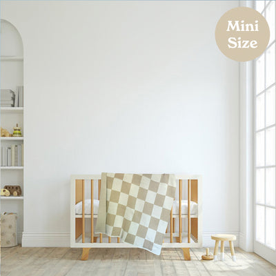 Neutral Nursery with Checkered Baby Blanket