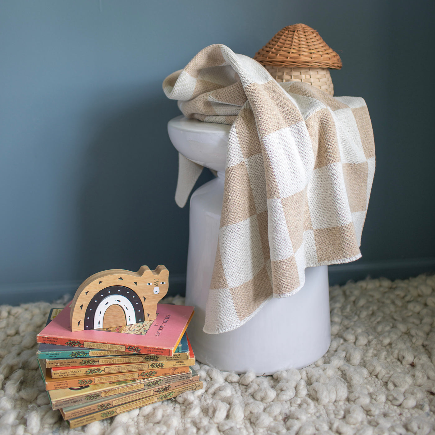 Neutral Checkered Blanket with kids toys