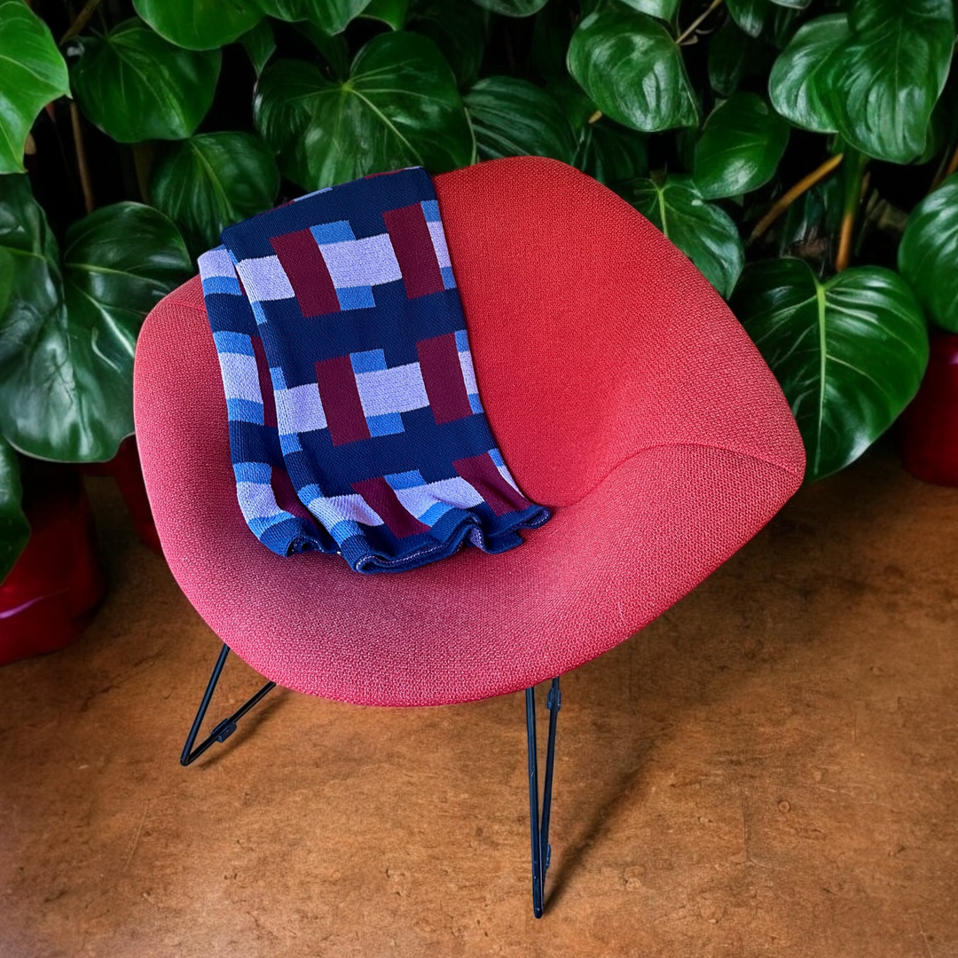 Modern Cotton Throw on Bertoia Diamond Chair 