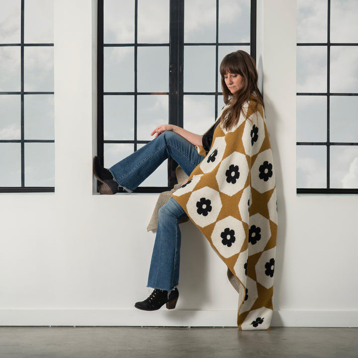 Woman Entrepreneur in Window with her Throw