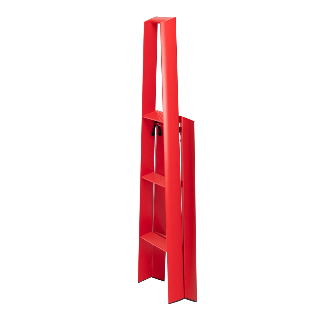 Red folded stepladder on a white background