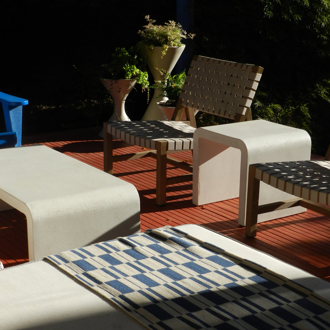 Modern Blue Checked Throw on a Sunny patio