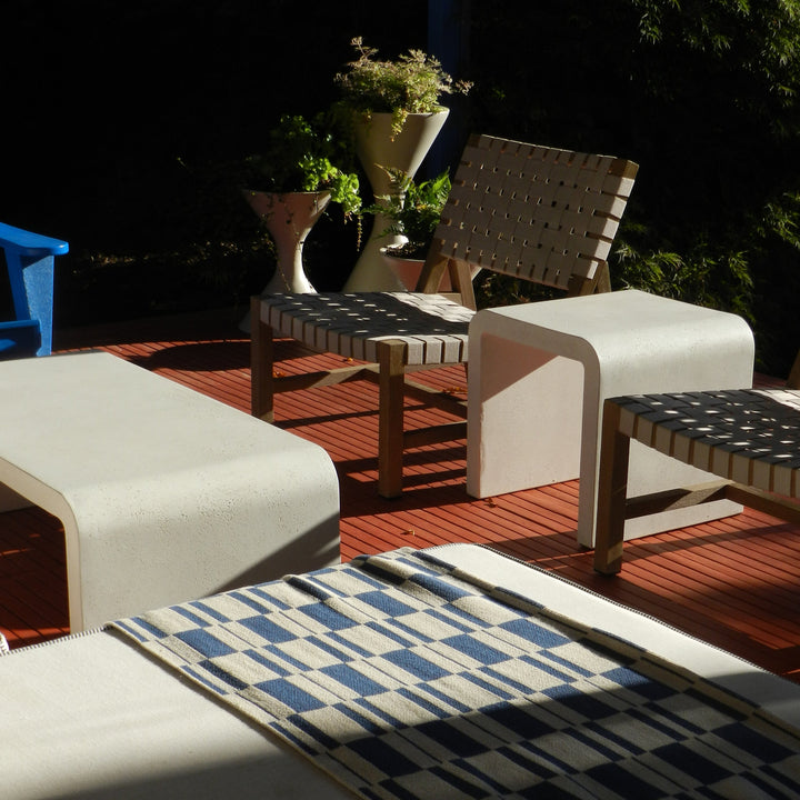 Modern Blue Checked Throw on a Sunny patio