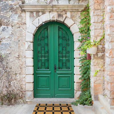 Old Green Door with Modern Grid Doormat