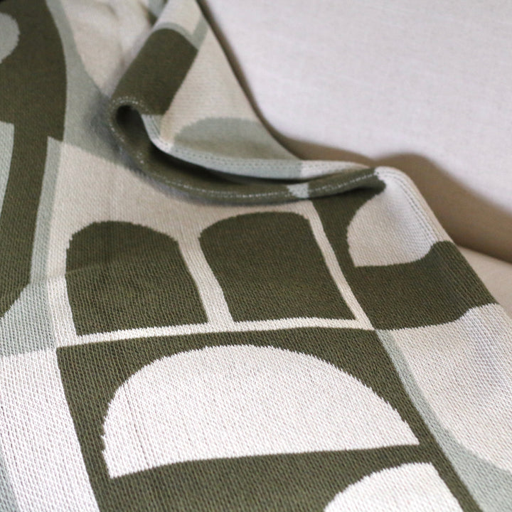 It's Takes a Villa Throw Blanket in Greens