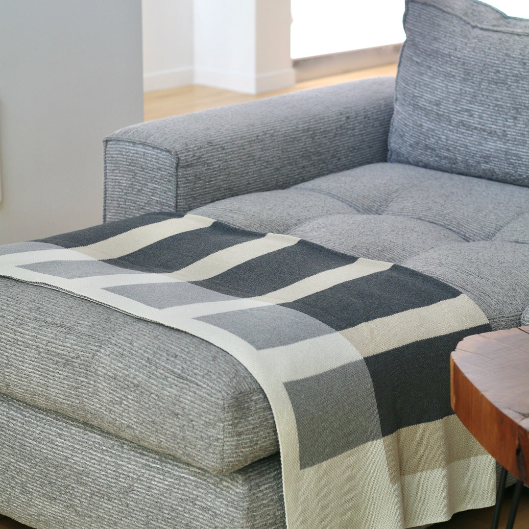 Simple Neutral Throw on Sofa Ottoman