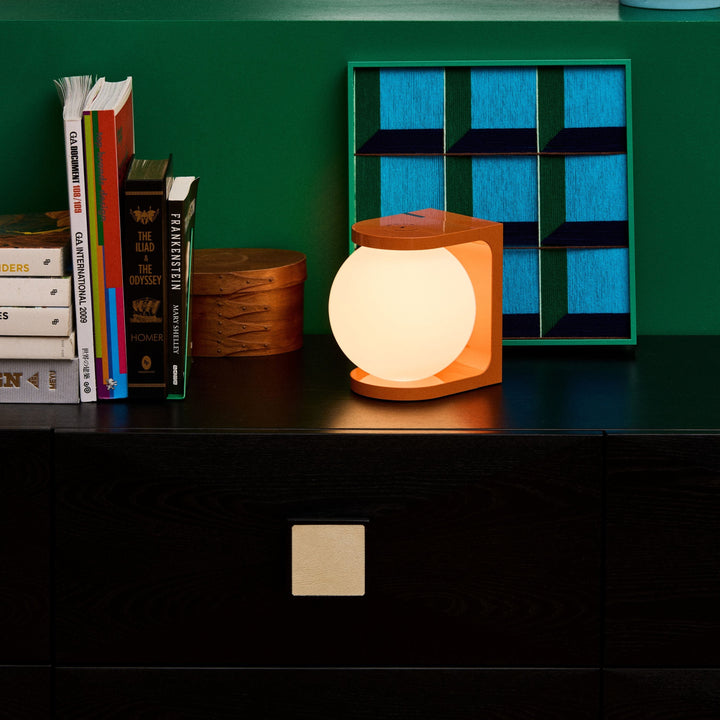 orange glow light on dresser