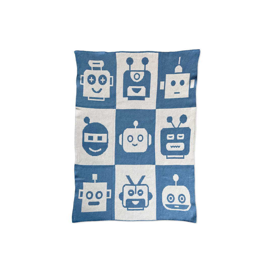 A baby blanket or throw, featuring a blue and off-white checkerboard pattern with stylized robot faces in the center of each square.