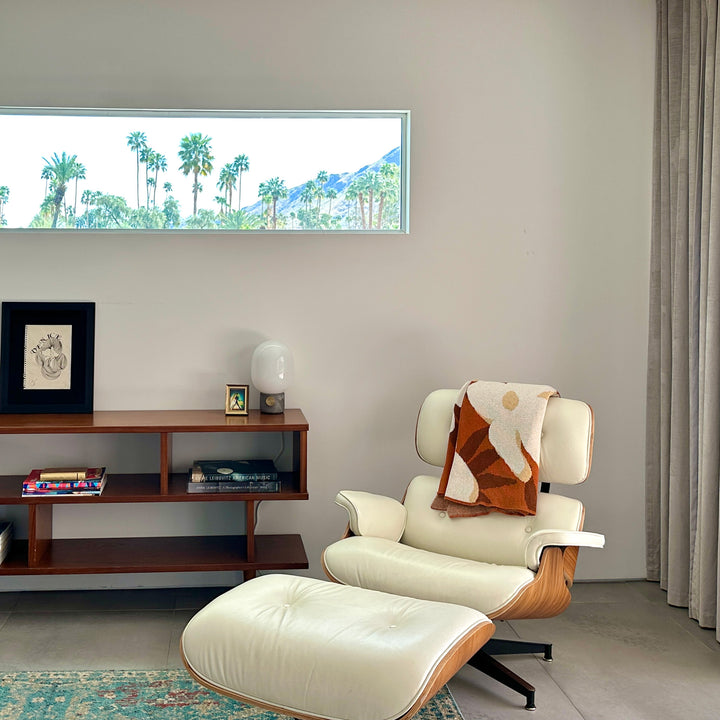 Eames Chair in MCM Bedroom with Rust Floral Throw