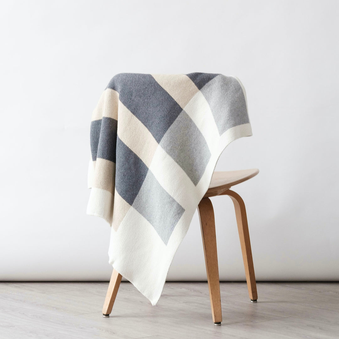 Simple Modern Neutral Throw ona  Chair